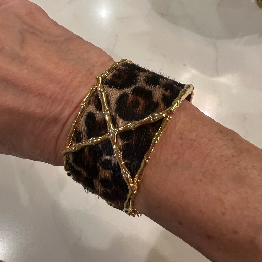 Hinged leopard hide bracelet   3 inch diameter like new